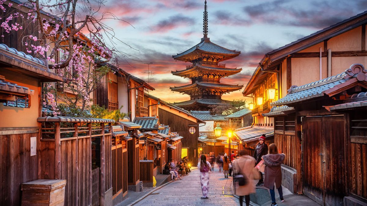 Pagoda above a Kyoto street at sunset